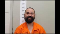 Mugshot of LE, DAVID